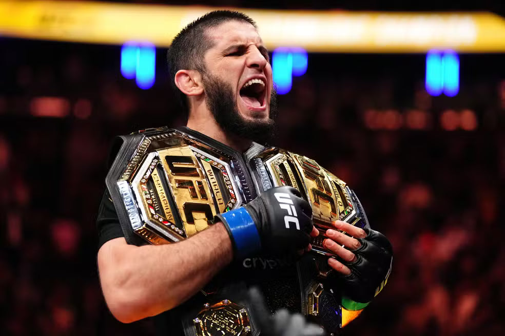 UFC 322: Islam Makhachev domina Jack Della Maddalena (50–45) e vira duplo-campeao; Valentina mantem o cinturao — todos os resultados, bonus e destaques do Brasil